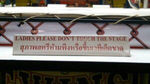 A sign that's been on each side of the Lumpinee ring since tourists starting watching fights at the stadium lumpinee women female dont touch