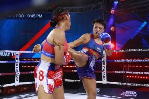 Thai-Ngan Le throwing a right middle kick at Muay Thai Super Champ in Thailand