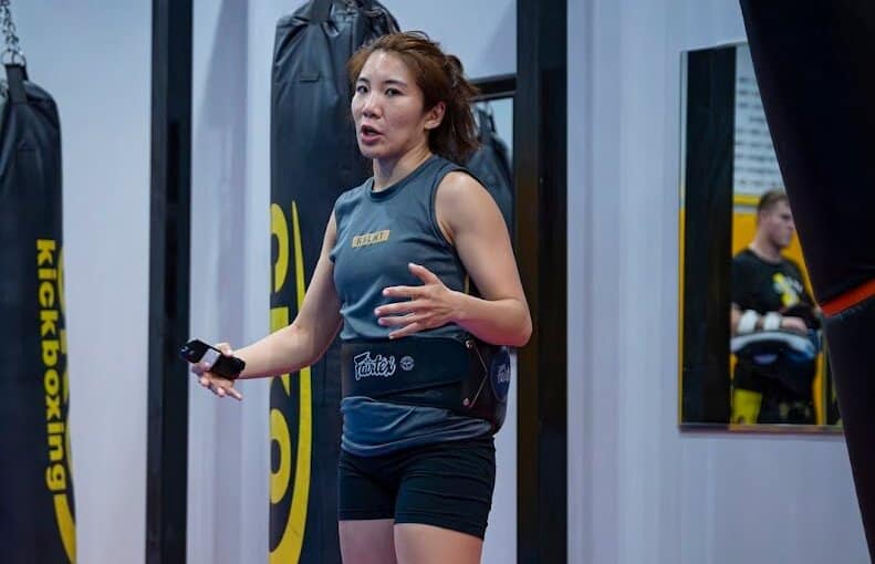 female muay thai instructor