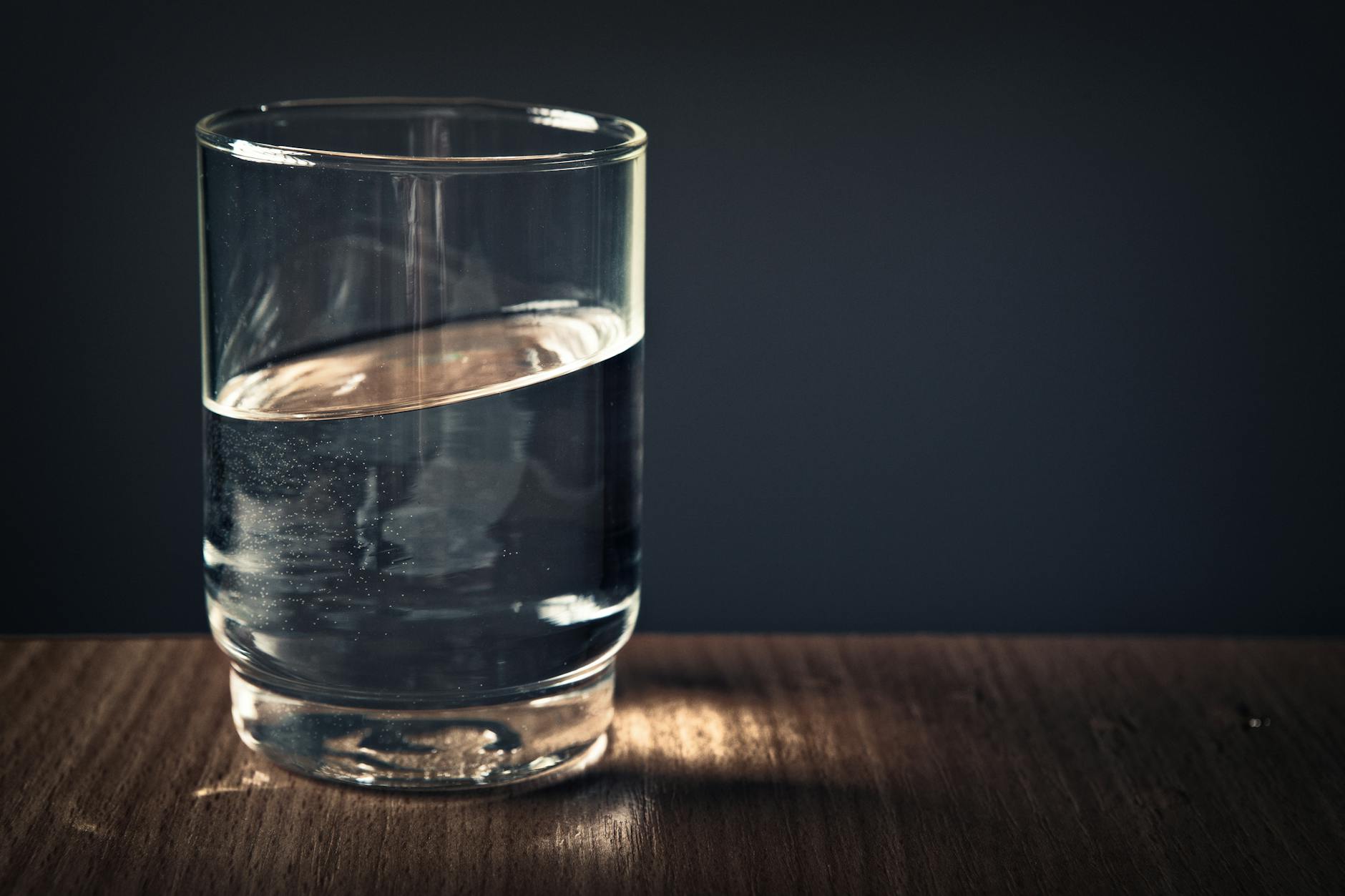 clear drinking glass filled with water