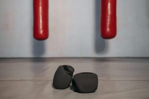 black boxing gloves on the floor